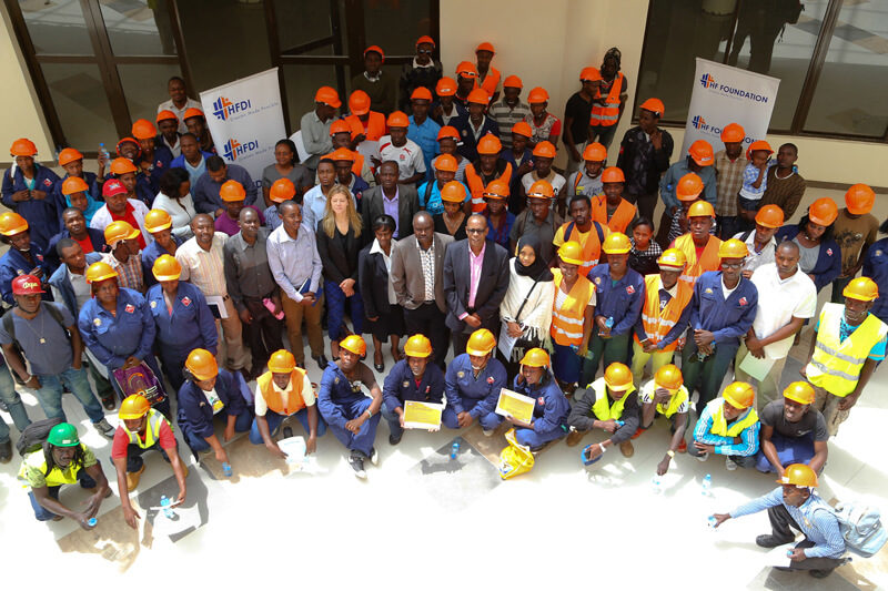 The Guests of Honor and the Housing Finance Graduates pose for a group photo during the ceremony.