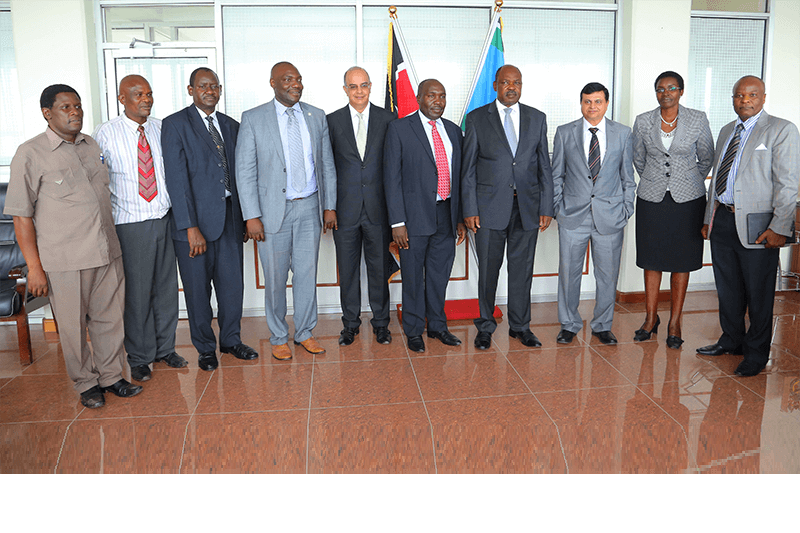 Crown Paints officials pose for a group photo with His Excellency the Governor of Kisumu, Hon Jack Raguma in his office.